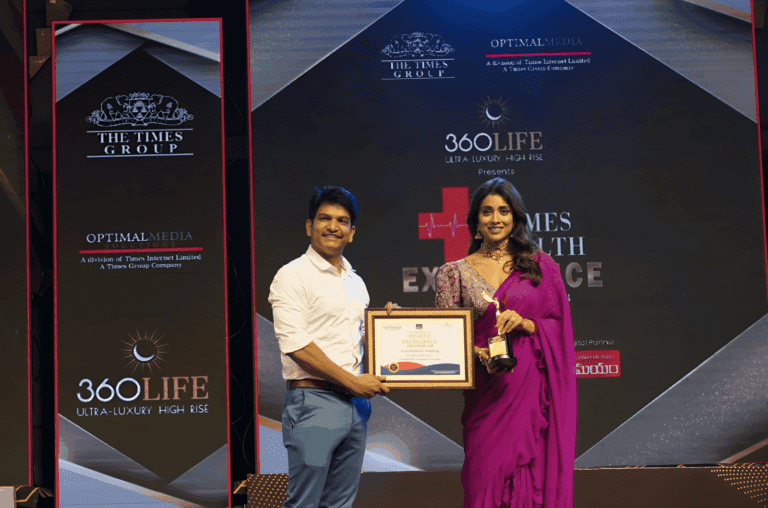 Dr. Teja Vinod Kesamsetty, founder of CosMediQ, receiving the Service Excellence in Dermatology Award by Times of India, 2023.